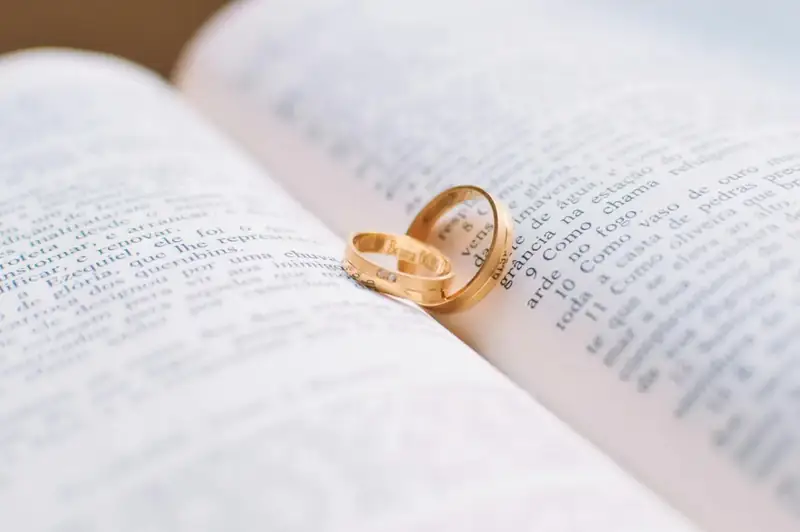 Rings resting on an open book
